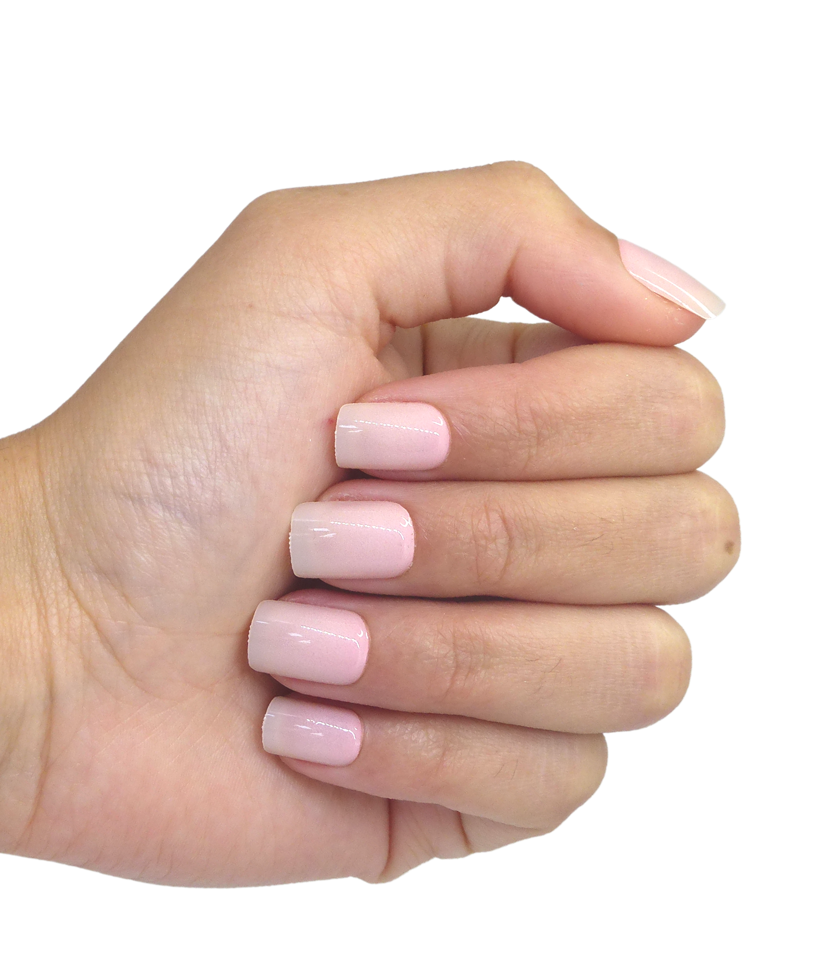 Main avec une manucure rose et blanche sur le bout de l'ongle